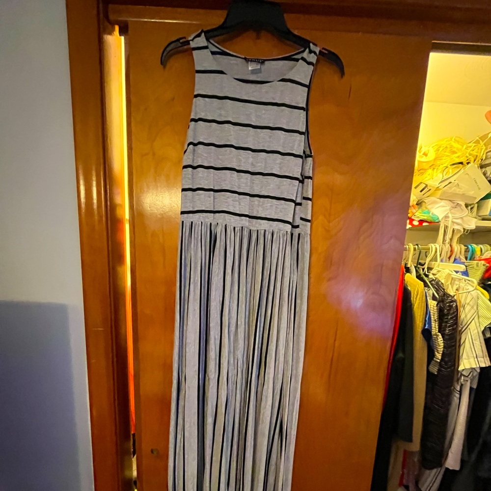 Long dress, casual or dress it up. Stretchie material . Grey with black stripes.